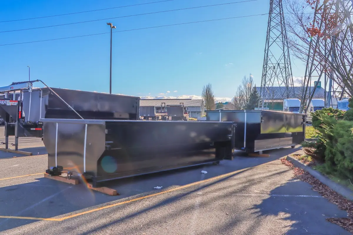 Roll-off dumpster ready for waste disposal at job site for Demolition Dumpster Rental in Statesville